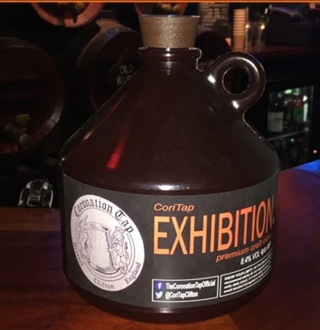 A reusable takeaway keg of Exhibition cider on the bar